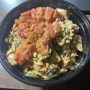 a close up of a poke sushi bowl