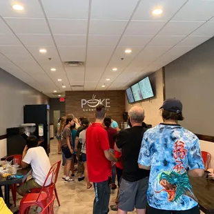 a large group of people eating