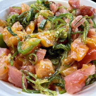 Large Bowl with 4 proteins. Tuna. Salmon. Seaweed salad. Green onions. Level 3 hot sauce. Wasabi. Soy sauce. Delicious.