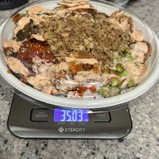 a plate of food on a scale
