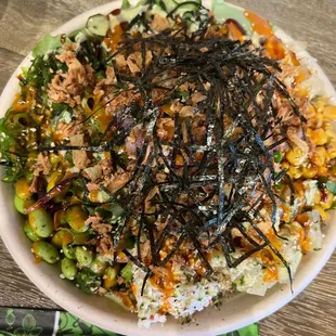 a plate of food with rice and vegetables
