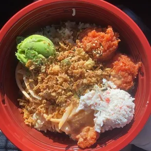 Medium poke w/ brown rice, 4 scoops of spicy tuna, crab, avocado, white onions, spicy mayo, sweet Hawaiian sauce, and fried onions