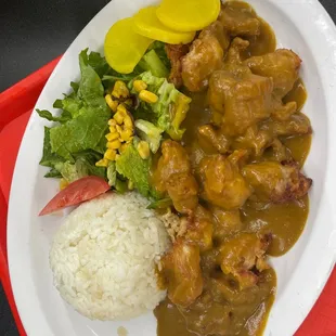 a plate of food on a tray