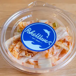 a plastic container filled with food