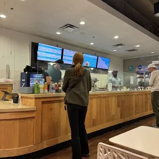 a man and a woman in a restaurant