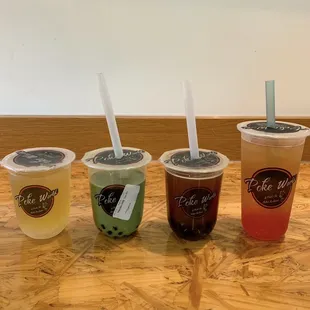Lychee Green Tea w/ lychee jelly, Matcha w/ tapioca, Passion Fruit Black Tea w/ tapioca, Blueberry Green Tea w/ strawberry popping pearl