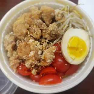 Build your own ramen $13.99 creamy vegan broth with tomatoes and bean spouts with crispy chicken and egg.