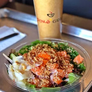 a bowl of food and a cup of coffee