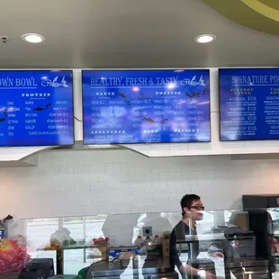 the menus on the wall above the counter