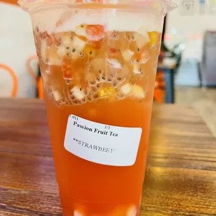 Passion fruit and strawberry green tea drink mixed....very sweet and okay sour.