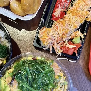 Avocado Salmon Poke bowl Sushi roll forgot the name and fried donuts