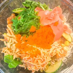 Delicious poke bowl with spicy tuna, tuna, and salmon!