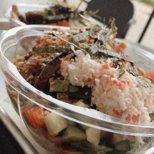 a plastic container of food on a table