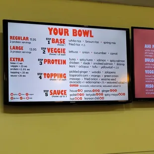 a menu on a wall in a restaurant