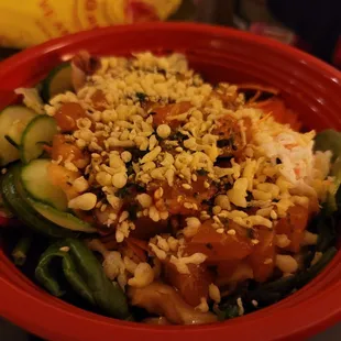 Large bowl with salad base and 3 proteins.