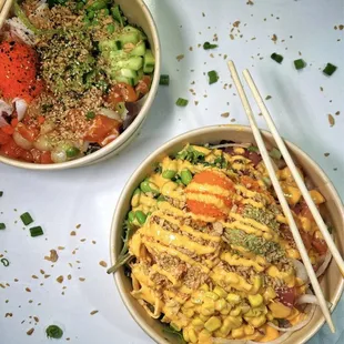 two bowls of food with chopsticks