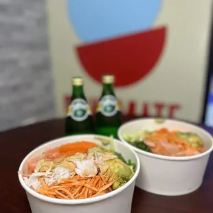 two bowls of food on a table