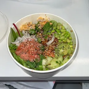 Tuna, Spicy Tuna, Ginger, Cucumber, Edamame, Avocado, Crab Meat, White onion, with Furikake on top