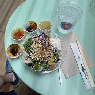 Build your own Poke Bowl with several sauce choices.