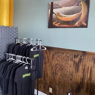 a rack of shirts in a restaurant