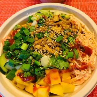 Build your own poke bowl, fresh tuna, crab meat, mango, fried onion, cilantro, cucumber, onion and sriracha over sushi rice.