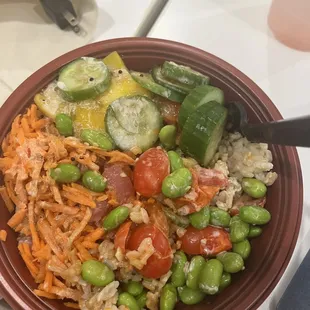 a bowl of rice and vegetables