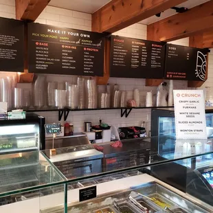 the inside of a restaurant with a variety of food items