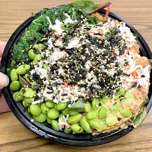 Medium Bowl - Spicy ahi, shoyu salmon over sushi rice and spring mix salad.  Ocean salad, crab salad, edamame and furikake : )