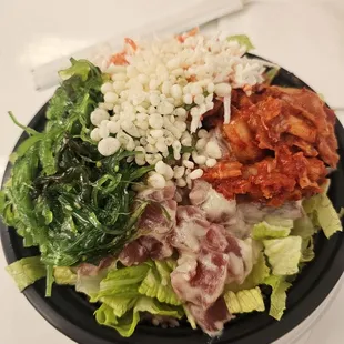 Small multigrain/salad with ahi. Delicious and generous toppings