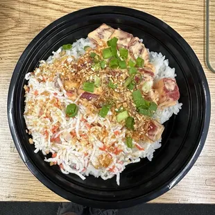 Sushi rice, imitation crab, spicy ahi, green onions, dried garlic