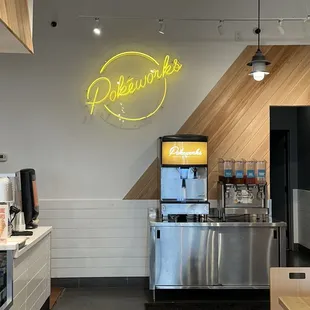 a coffee shop with a neon sign