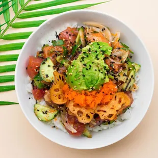 a bowl of food with rice and vegetables