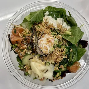 a salad in a clear bowl