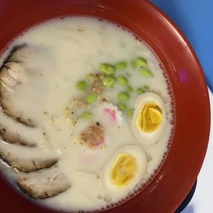 Ramen: Pork Bone Broth with marinated eggs, edamame and garlic.