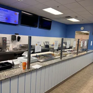 the counter area of a fast food restaurant