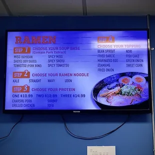 a menu displayed on a wall
