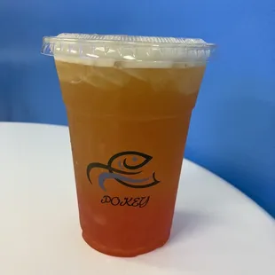 Peach green tea with strawberry popping balls
