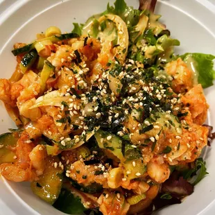 Specially marinated fresh shrimp poke bowl with delicious vegetables. Topped with sesame seeds, seaweed mix and chopped green onions.