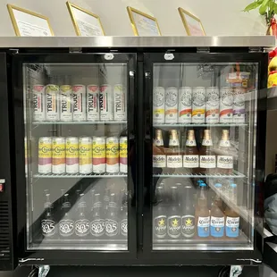 Seltzers and beers in cans and bottles available. Sapporo, Modelo, 805, Non-Alcoholic Corona, Truly, Topo-Chico, White Claw.