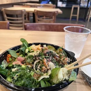regular poke bowl with spicy tuna, salmon and spicy creamy tuna with no rice. Salad as the base.