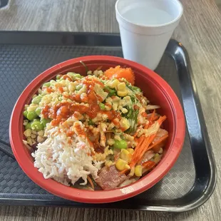 Poke bowl with tuna, shrimp and salmon. Lots of toppings available.