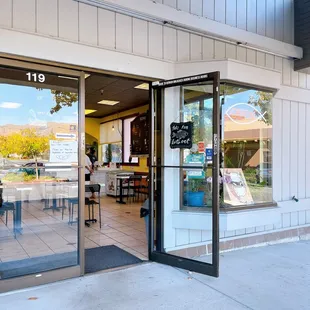 the entrance to a restaurant