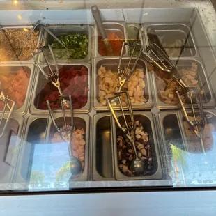 a variety of food items in a display case