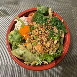 3 scoops of protein on white rice and spring mix