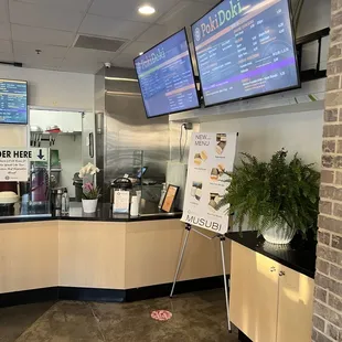 a restaurant counter and menus