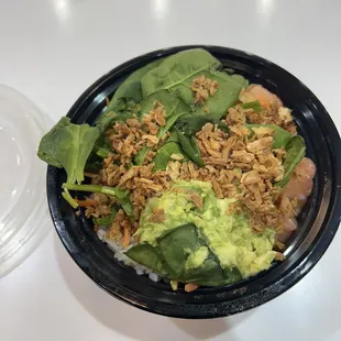 Poki bowl with salmon, white rice, and extra avocado (very delicious!)