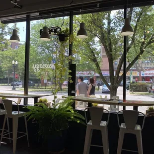 a view of a city street through a window