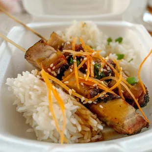 Peppercorn pork belly skewers