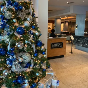 Entrance to restaurant and Christmas tree
