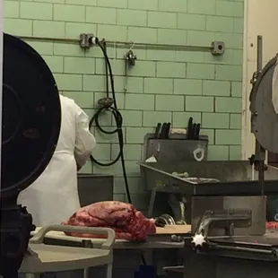 a chef preparing meat
